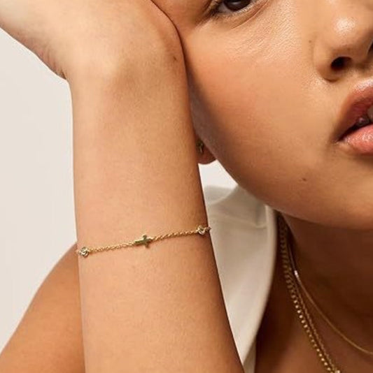 Compact Cross Charm Bracelet For A Touch Of Coastal Luxury